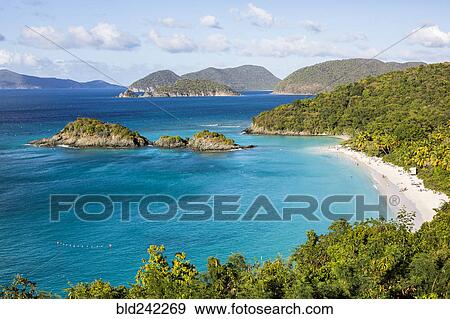 Lush hillsides near tropical ocean View Large Photo Image Stock Photo - Lush hillsides near tropical ocean. Fotosearch