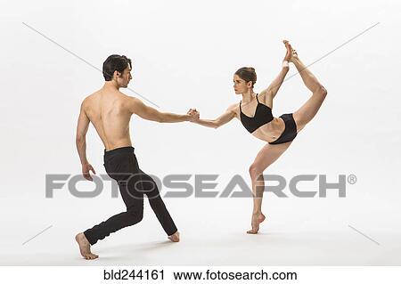 Stock Image - Man and woman ballet dancing. Fotosearch