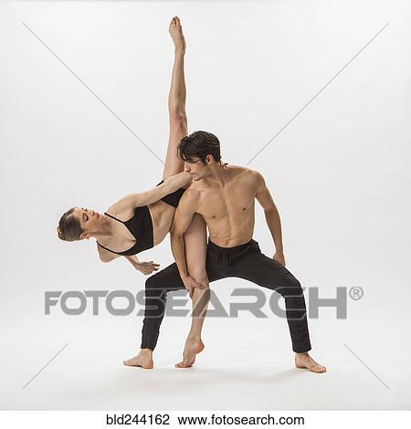Stock Image - Man and woman ballet dancing. Fotosearch