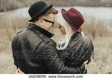 Middle Eastern couple hugging near lake View Large Photo Image Stock Photography - Middle Eastern couple hugging near lake. Fotosearch