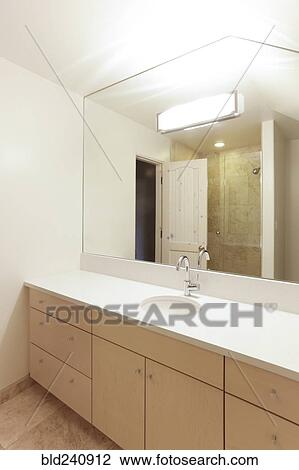 Mirror over sink in modern bathroom View Large Photo Image Stock Image - Mirror over sink in modern bathroom. Fotosearch