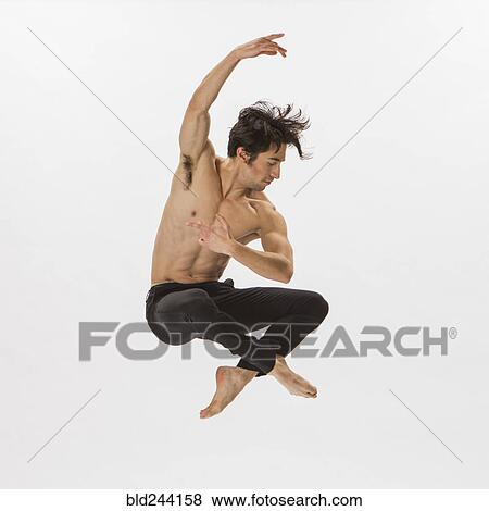 Stock Photo - Mixed Race man ballet dancing. Fotosearch