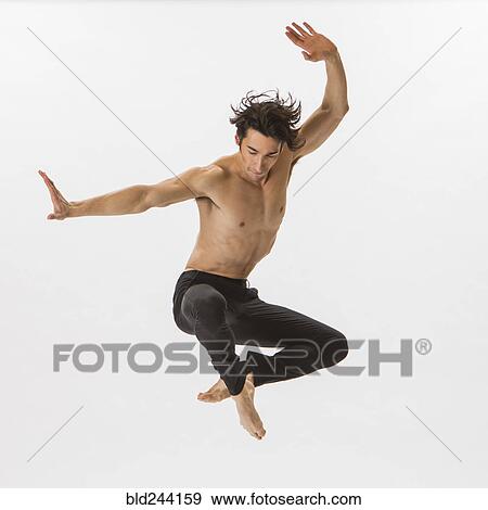 Stock Photo - Mixed Race man ballet dancing. Fotosearch