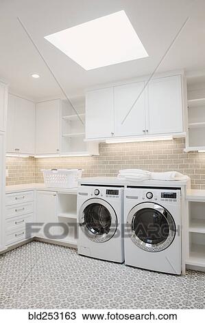 Stock Image - Modern laundry room. Fotosearch