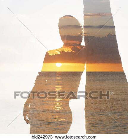 Multiple exposure of Caucasian woman leaning on palm tree near ocean View Large Photo Image Stock Image - Multiple exposure of Caucasian woman leaning on palm tree near ocean. Fotosearch