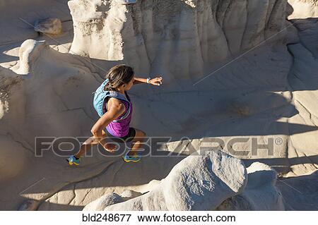 Native American woman running in desert View Large Photo Image Stock Photo - Native American woman running in desert. Fotosearch