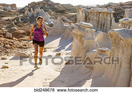Native American woman running in desert View Large Photo Image Stock Photo - Native American woman running in desert. Fotosearch