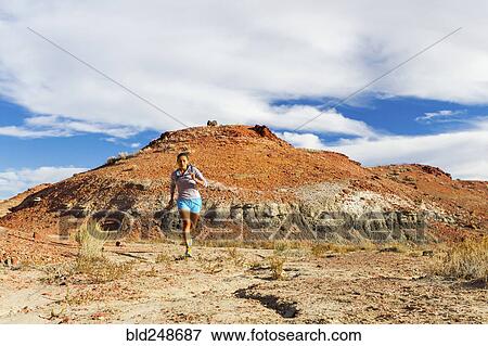 Native American woman running in desert View Large Photo Image Stock Photo - Native American woman running in desert. Fotosearch