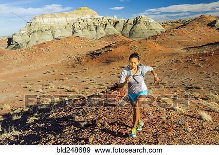 Native American woman running in desert View Large Photo Image Stock Photo - Native American woman running in desert. Fotosearch