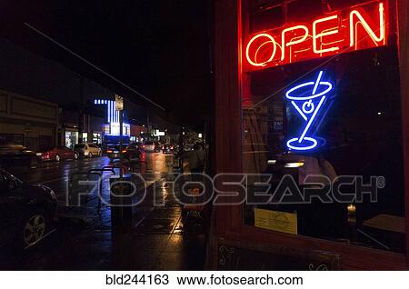 Neon sign in bar window at night View Large Photo Image Stock Image - Neon sign in bar window at night. Fotosearch