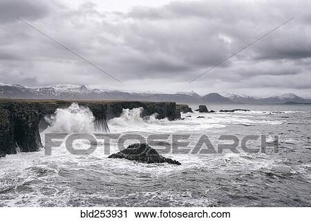 Ocean waves splashing on cliffs, Hellissandur, Snaellsnes peninsula, Iceland View Large Photo Image Stock Image - Ocean waves splashing on cliffs, Hellissandur, Snaellsnes peninsula, Iceland. Fotosearch