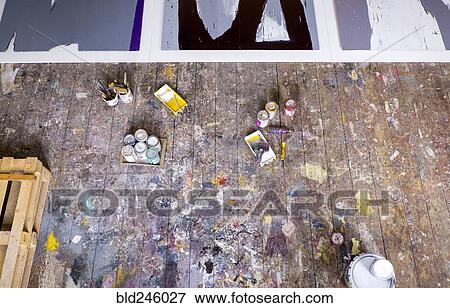 Paint supplies on floor of art studio View Large Photo Image Stock Photo - Paint supplies on floor of art studio. Fotosearch