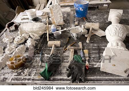 Painting and sculpting tools on messy table View Large Photo Image Picture - Painting and sculpting tools on messy table. Fotosearch