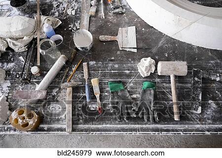 Painting and sculpting tools on messy table View Large Photo Image Stock Photo - Painting and sculpting tools on messy table. Fotosearch