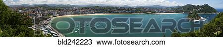 Stock Image - Panoramic view of harbor and bay, San Sebastian, Basque Autonomous Community, Spain. Fotosearch