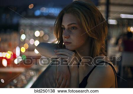 Pensive Caucasian teenage girl leaning on railing View Large Photo Image Stock Photo - Pensive Caucasian teenage girl leaning on railing. Fotosearch
