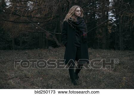 Pensive Caucasian woman standing in field View Large Photo Image Stock Image - Pensive Caucasian woman standing in field. Fotosearch