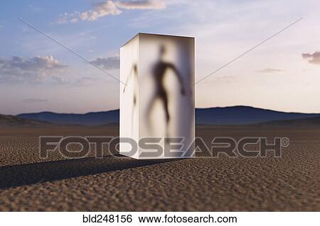 Stock Photograph - Person frozen in suspended animation in desert. Fotosearch