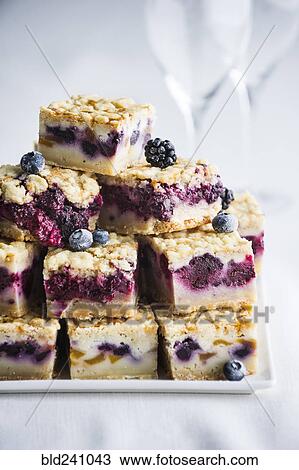 Pile of berry cobbler slices on tray View Large Photo Image Stock Image - Pile of berry cobbler slices on tray. Fotosearch