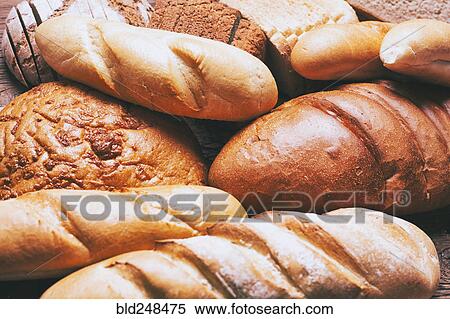 Pile of loaves of bread View Large Photo Image Stock Photography - Pile of loaves of bread. Fotosearch