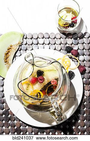 Pitcher of sangria with fruit View Large Photo Image Stock Photo - Pitcher of sangria with fruit. Fotosearch
