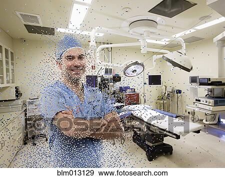Pixilated Caucasian surgeon standing in operating room View Large Photo Image Stock Photo - Pixilated Caucasian surgeon standing in operating room. Fotosearch