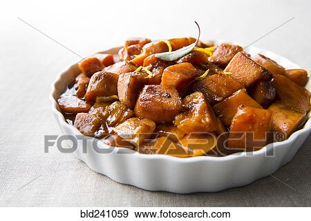 Plate of candied yams View Large Photo Image Stock Photo - Plate of candied yams. Fotosearch