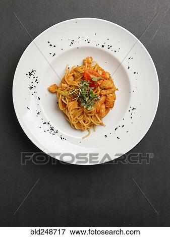 Stock Photo - Plate of seafood pasta. Fotosearch