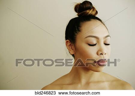 Portrait of Asian woman with eyes closed View Large Photo Image Stock Image - Portrait of Asian woman with eyes closed. Fotosearch