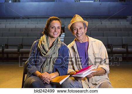 Portrait of Caucasian actors with scripts in theater View Large Photo Image Stock Photo - Portrait of Caucasian actors with scripts in theater. Fotosearch