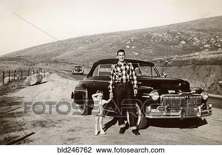 Portrait of Caucasian father and daughter posing near vintage car View Large Photo Image Stock Image - Portrait of Caucasian father and daughter posing near vintage car. Fotosearch