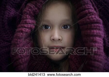 Portrait of Caucasian girl covering head with sweater View Large Photo Image Stock Image - Portrait of Caucasian girl covering head with sweater. Fotosearch