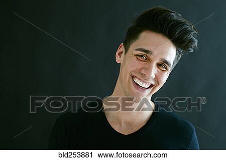 Stock Image - Portrait of Caucasian man laughing. Fotosearch