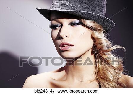 Portrait of Caucasian woman wearing fedora View Large Photo Image Stock Photo - Portrait of Caucasian woman wearing fedora. Fotosearch
