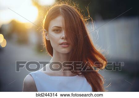 Portrait of Caucasian woman with hair covering face View Large Photo Image Picture - Portrait of Caucasian woman with hair covering face. Fotosearch