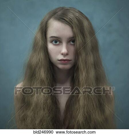 Portrait of Caucasian woman with long hair View Large Photo Image Stock Image - Portrait of Caucasian woman with long hair. Fotosearch