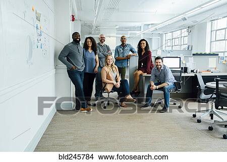 Portrait of diverse business people in office View Large Photo Image Picture - Portrait of diverse business people in office. Fotosearch