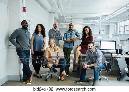 Portrait of diverse business people in office View Large Photo Image Stock Image - Portrait of diverse business people in office. Fotosearch