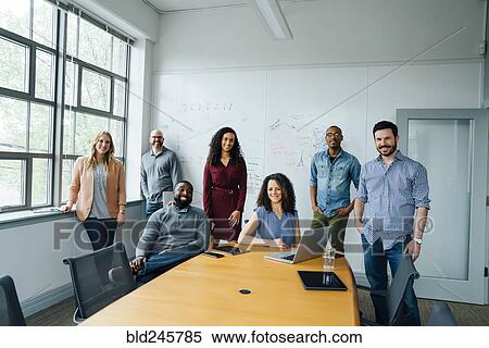 Portrait of diverse business people in conference room View Large Photo Image Stock Photography - Portrait of diverse business people in conference room. Fotosearch