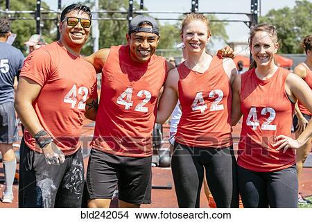 Portrait of friends wearing shirts with number 42 View Large Photo Image Picture - Portrait of friends wearing shirts with number 42. Fotosearch