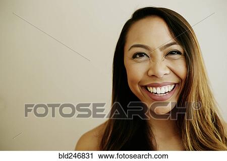 Portrait of laughing Asian woman View Large Photo Image Stock Image - Portrait of laughing Asian woman. Fotosearch