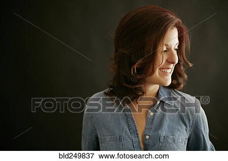 Portrait of laughing Caucasian woman View Large Photo Image Stock Photo - Portrait of laughing Caucasian woman. Fotosearch