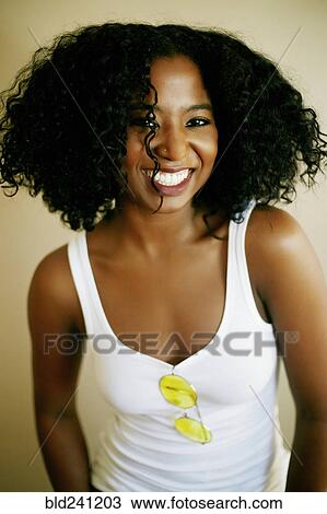 Portrait of laughing Mixed Race woman View Large Photo Image Stock Image - Portrait of laughing Mixed Race woman. Fotosearch