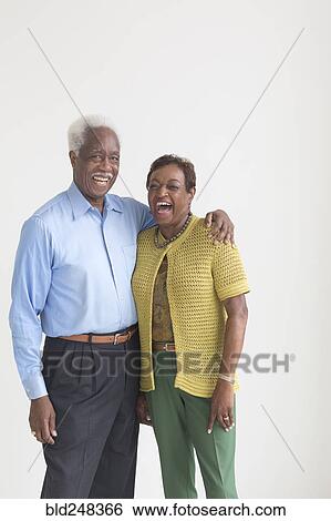 Portrait of laughing older Black couple View Large Photo Image Stock Photograph - Portrait of laughing older Black couple. Fotosearch