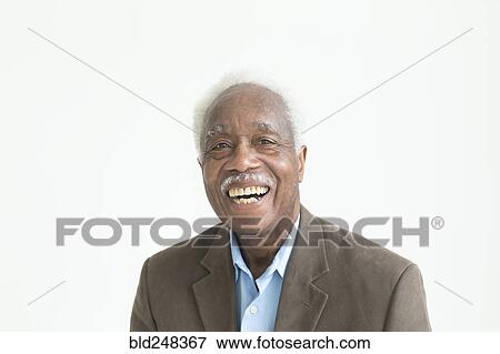 Stock Photo - Portrait of laughing older Black man. Fotosearch