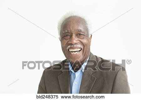 Stock Photography - Portrait of laughing older Black man. Fotosearch