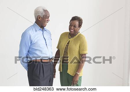 Portrait of older Black couple laughing View Large Photo Image Stock Image - Portrait of older Black couple laughing. Fotosearch