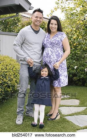 Portrait of parents and daughter View Large Photo Image Stock Photo - Portrait of parents and daughter. Fotosearch