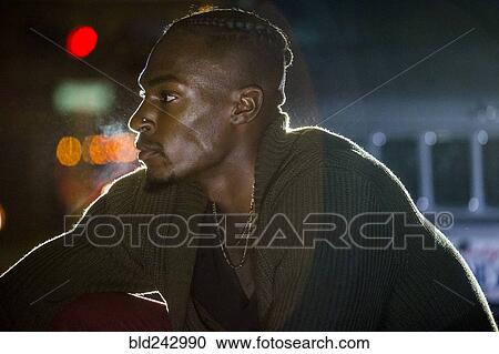 Portrait of pensive Black man View Large Photo Image Stock Image - Portrait of pensive Black man. Fotosearch