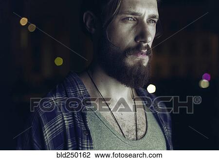 Portrait of pensive Caucasian man with beard View Large Photo Image Stock Image - Portrait of pensive Caucasian man with beard. Fotosearch